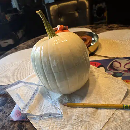 Draw a Line in the Middle of Your Halloween Pokémon Ball with a Pencil